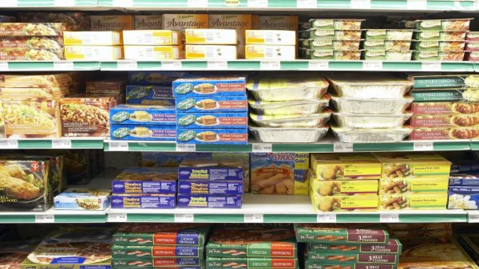 Shelves of food items merchandised for sale