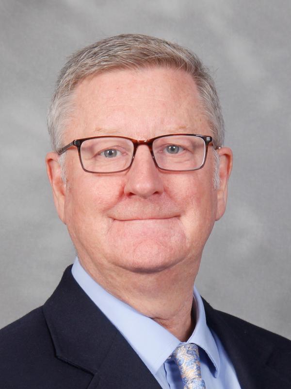 Headshot of Dr. Gregg Gascon